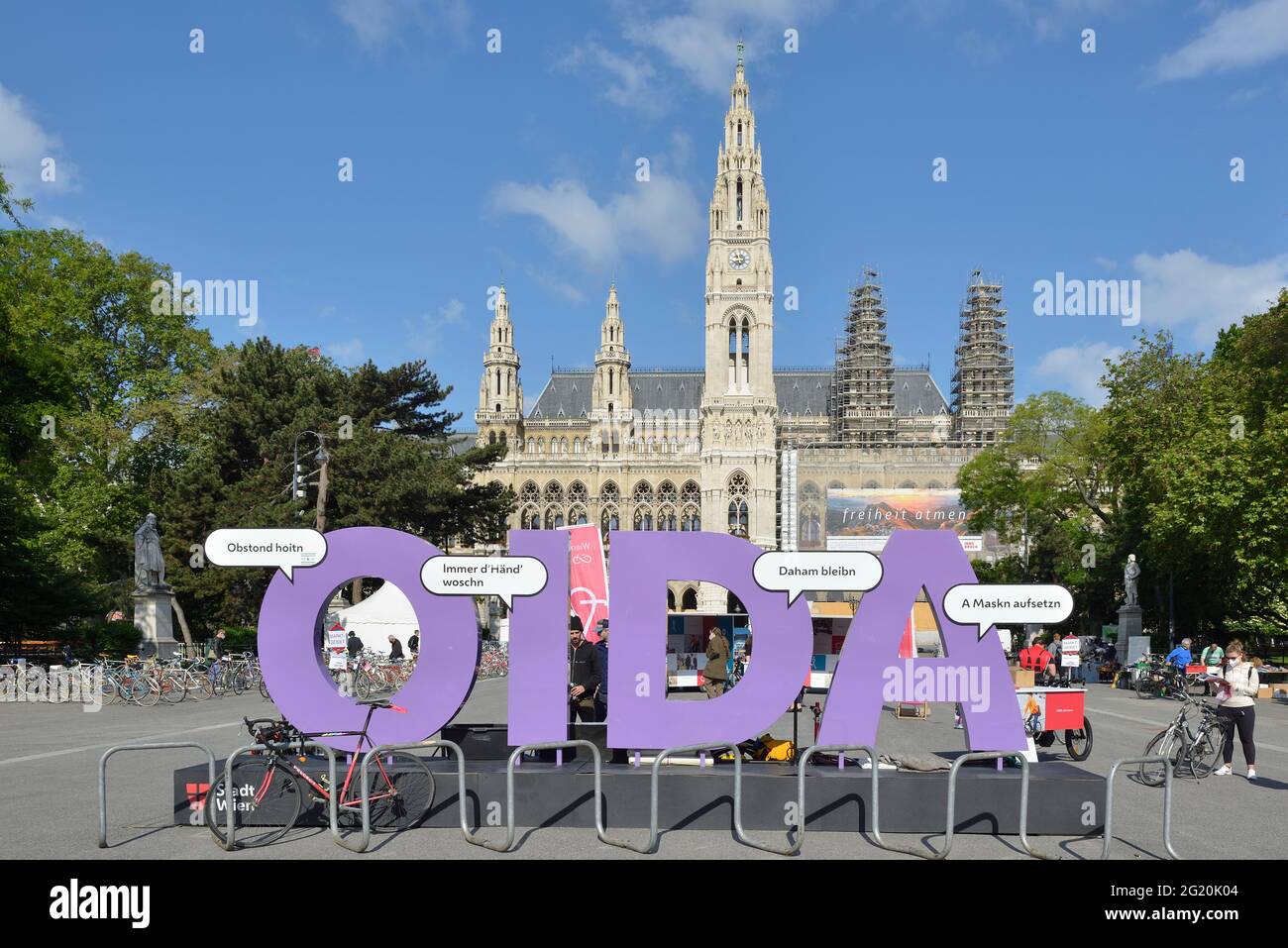 Vienna, Austria. Corona hygiene requirements are presented in front of the Vienna City Hall. Keep your distance, wash your hands, stay at home and put Stock Photo