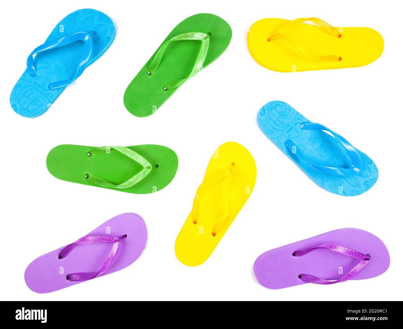 rubber flip flops of different colors on a white background, view from ...