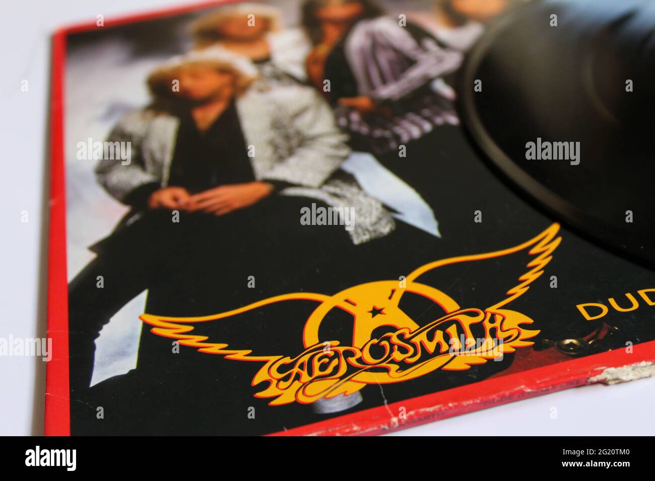 Classic rock band, Aerosmith, music album on vinyl record LP disc. Titled Dude looks like a lady single Album Cover Stock Photo