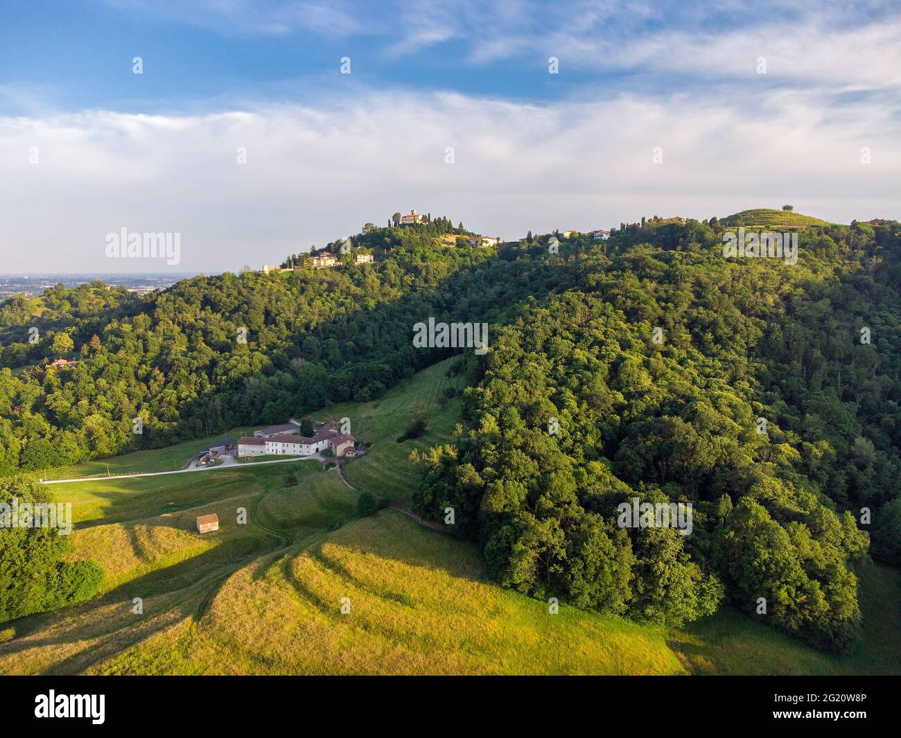 Aerial landscape drone view of the village of Montevecchia in Montevecchia and Curone Valley regional park, Brianza, Lombardy, Italy Stock Photo