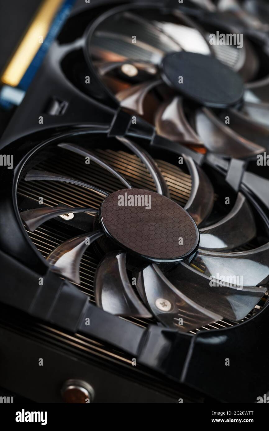 Video card cooling system cooler close-up. Progressive cooling system for the video chip, processor and memory. Selective focus, macro Stock Photo