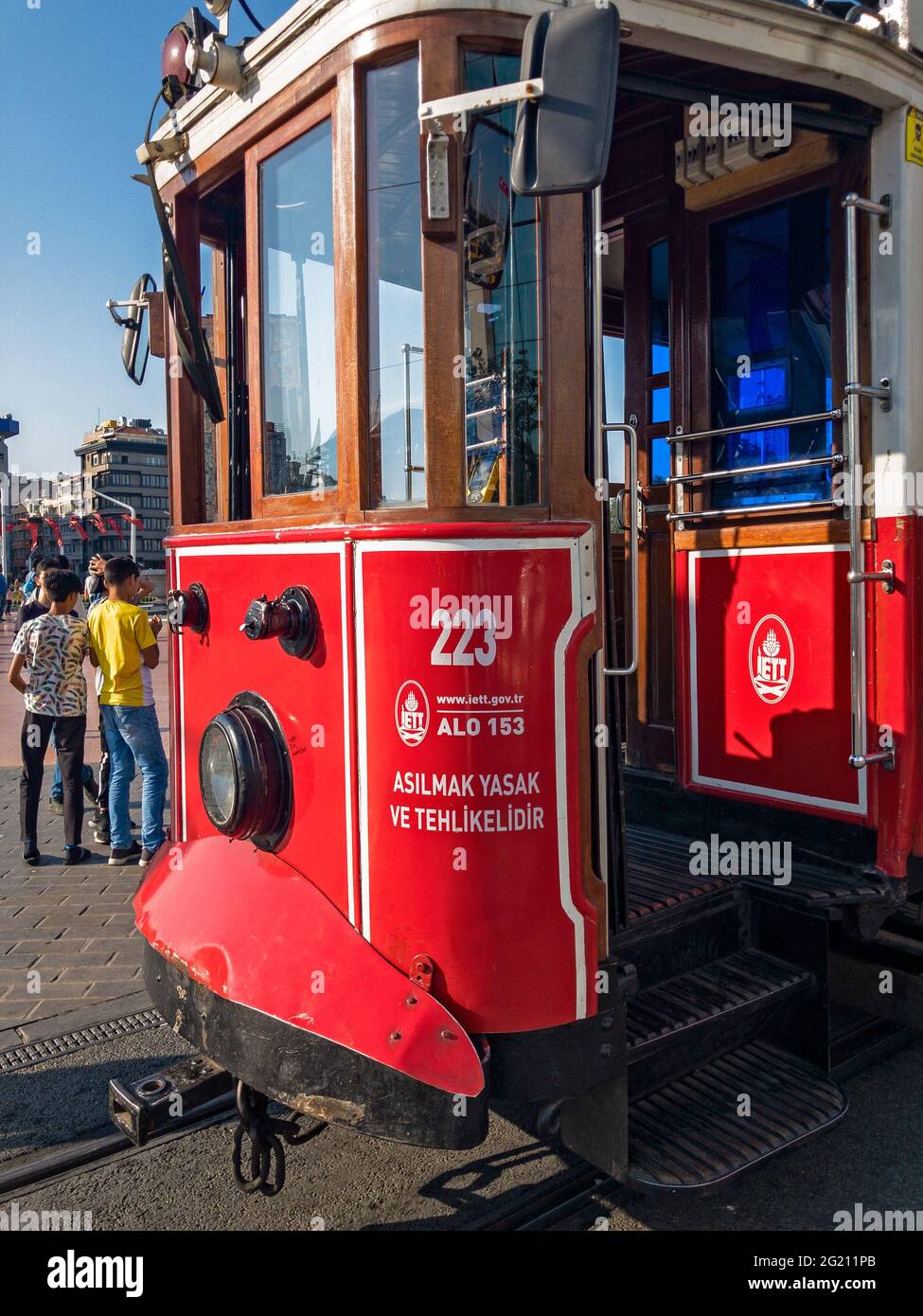 Typical historical tram on Istikal street, the red tram departs from Taksim Square in the heart of Istanbul, Turkey. 06-22-2019 Stock Photo