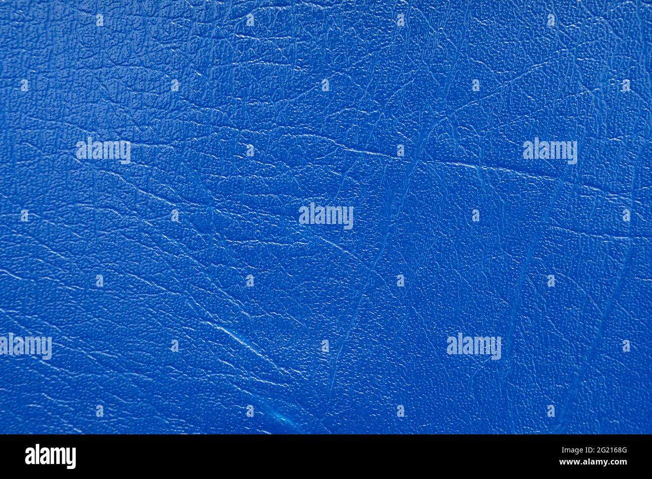 Background image - blue leather with an abstract texture. Stock Photo