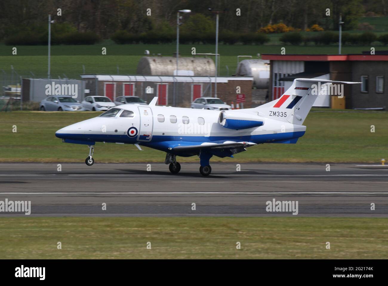 ZM335, an Embraer Phenom T.1 operated by No.45 Squadron of the Royal Air Force, arriving at Prestwick International Airport in Ayrshire, Scotland. Stock Photo