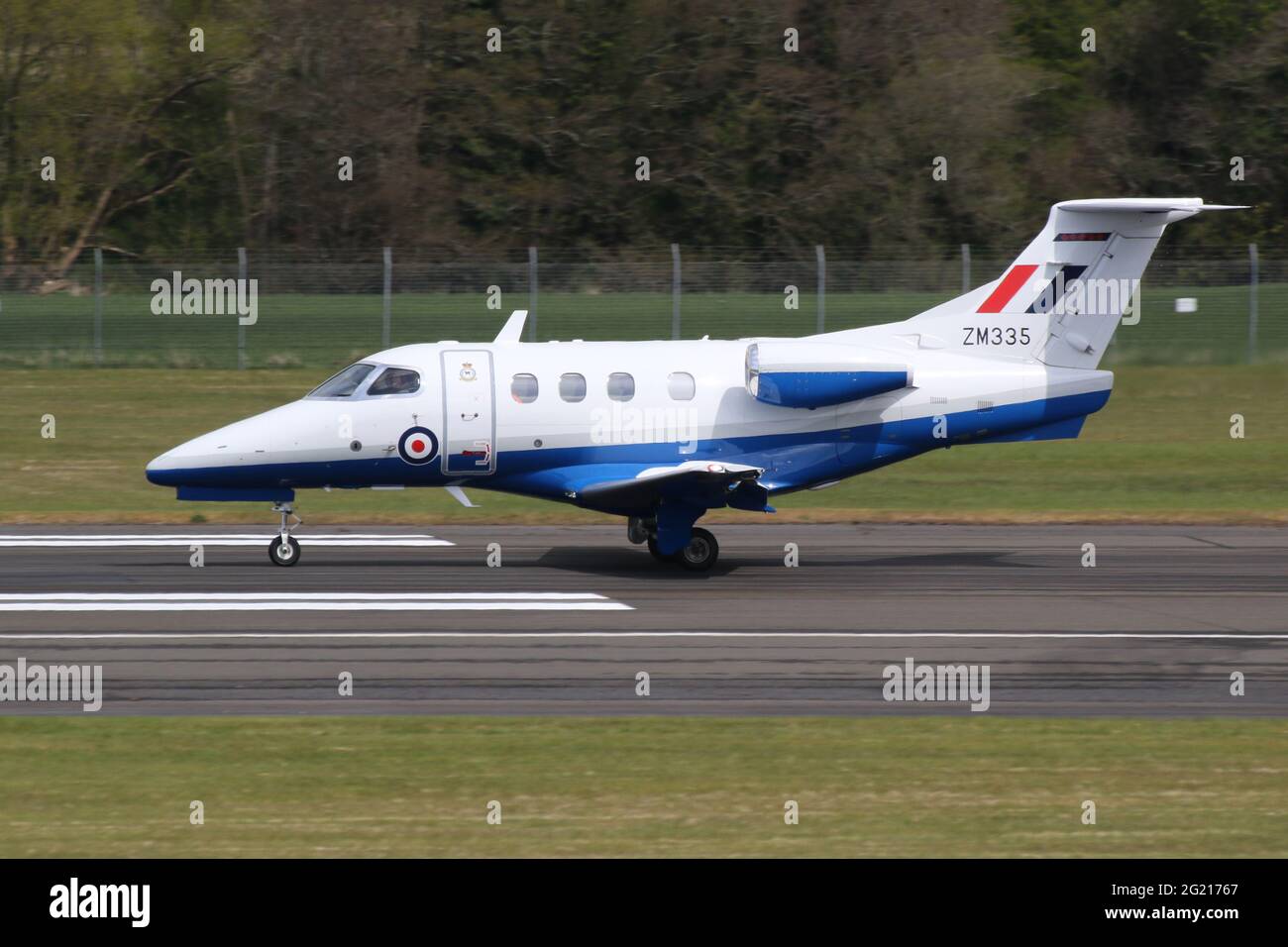 ZM335, an Embraer Phenom T.1 operated by No.45 Squadron of the Royal Air Force, arriving at Prestwick International Airport in Ayrshire, Scotland. Stock Photo