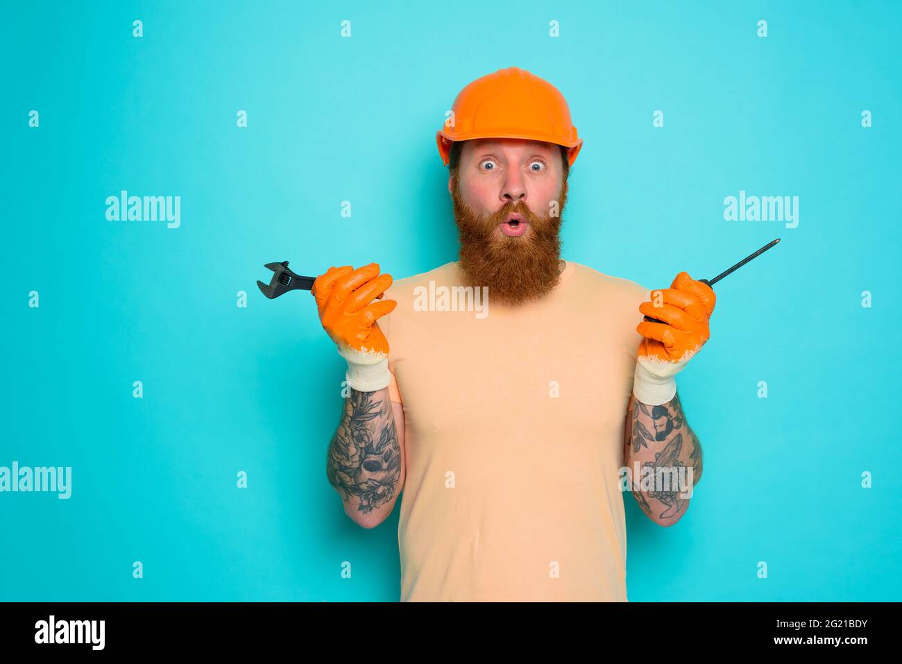 Incompetent worker is afraid and worried about his work Stock Photo