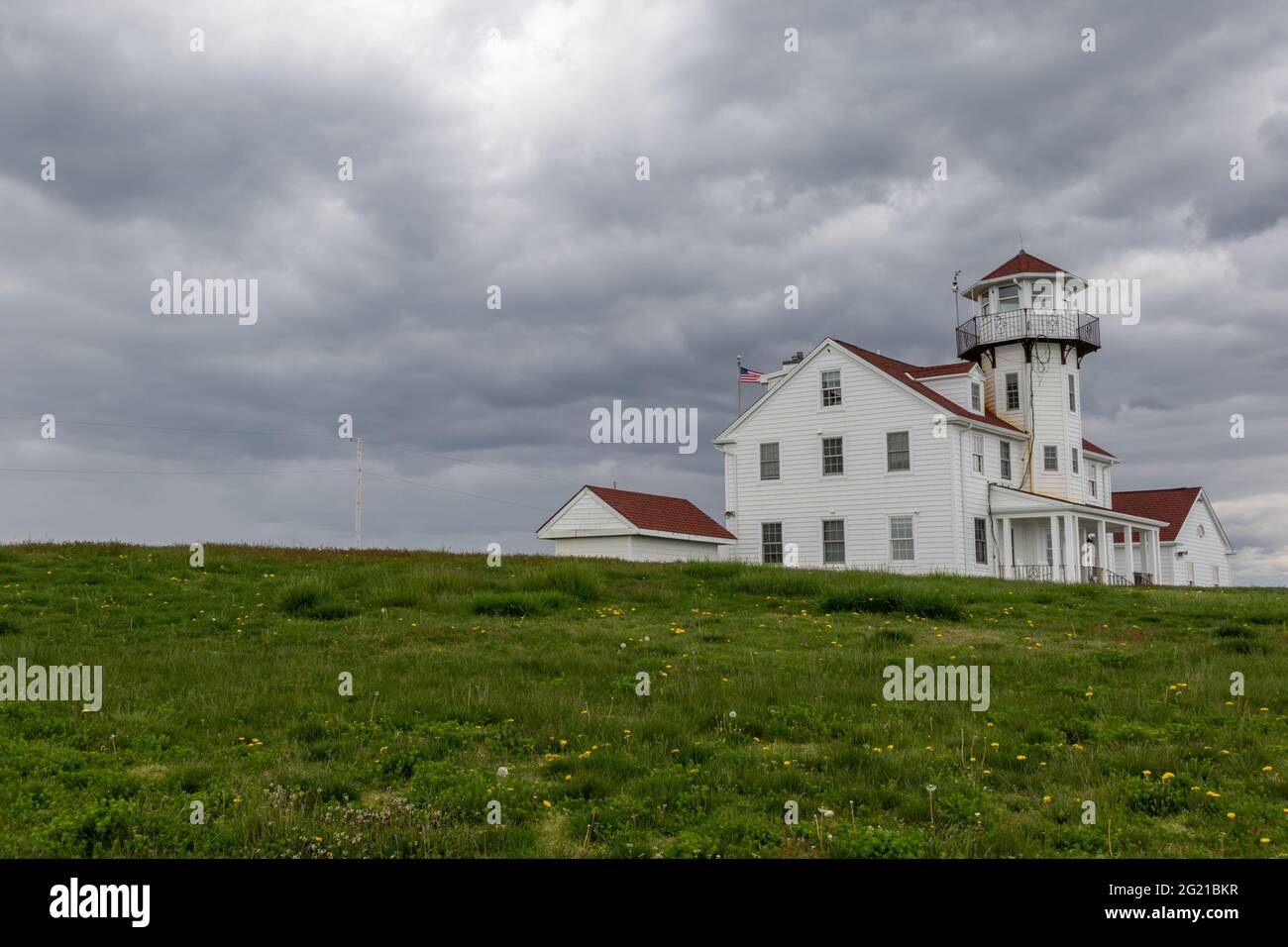 Point Judith Lighthouse in Narragansett, Rhode Island, on a cloudy day in May Stock Photo