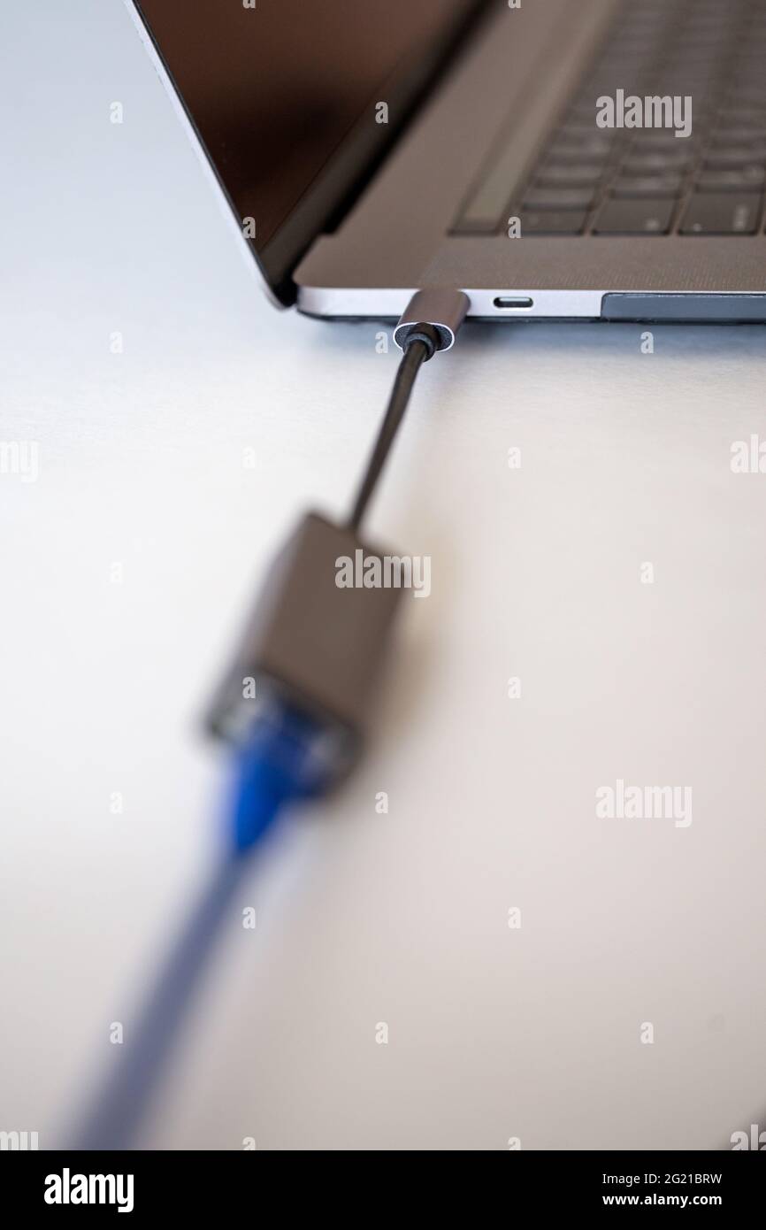 ethernet - type c adapter for laptop on white background Stock Photo ...