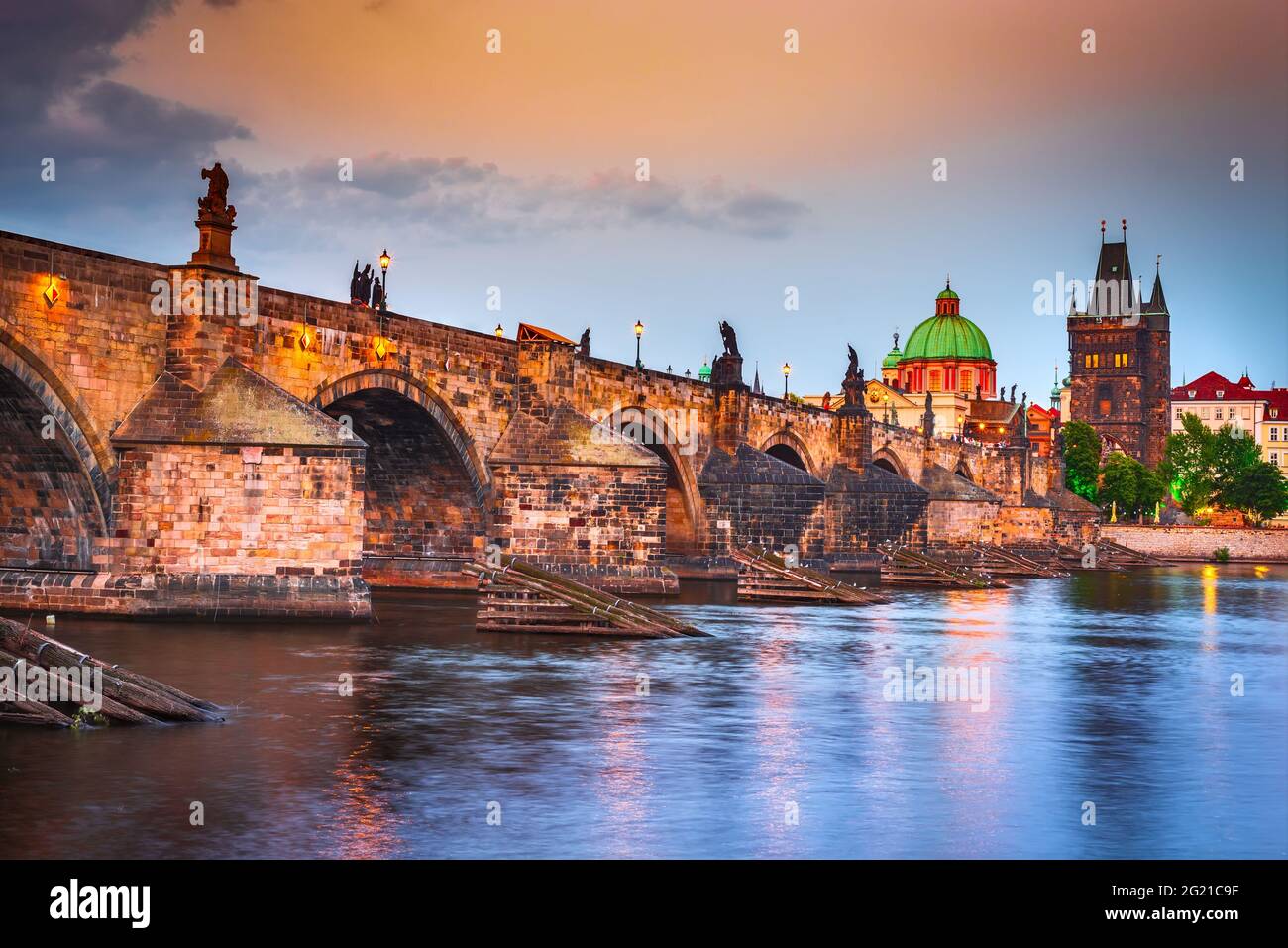 Prague, Czech Republic. The famous Charles Bridge sunset and Stare Mesto, Bohemia travel place in Europe Stock Photo