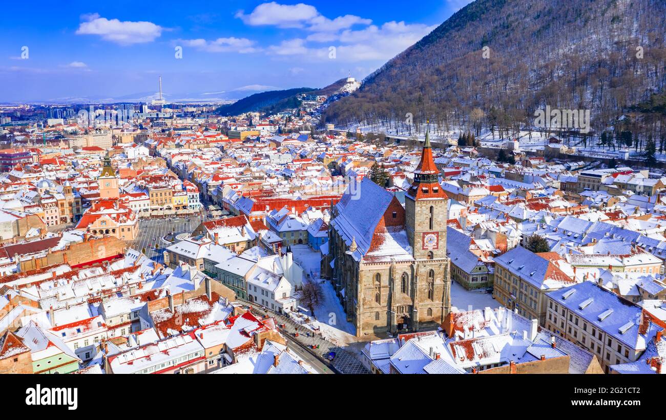 Brasov, Transylvania. Council Square and Black Church. Carpathian Mountains travel background in Romania. Stock Photo