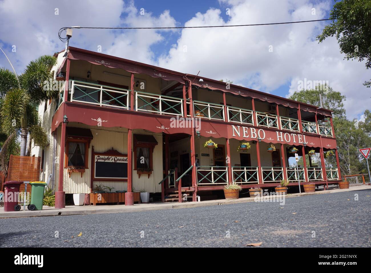 The historic and heritage listed old Nebo Hotel, built in 1886 in the Queenslander style, has wide verandas and corrugated iron walls. Stock Photo