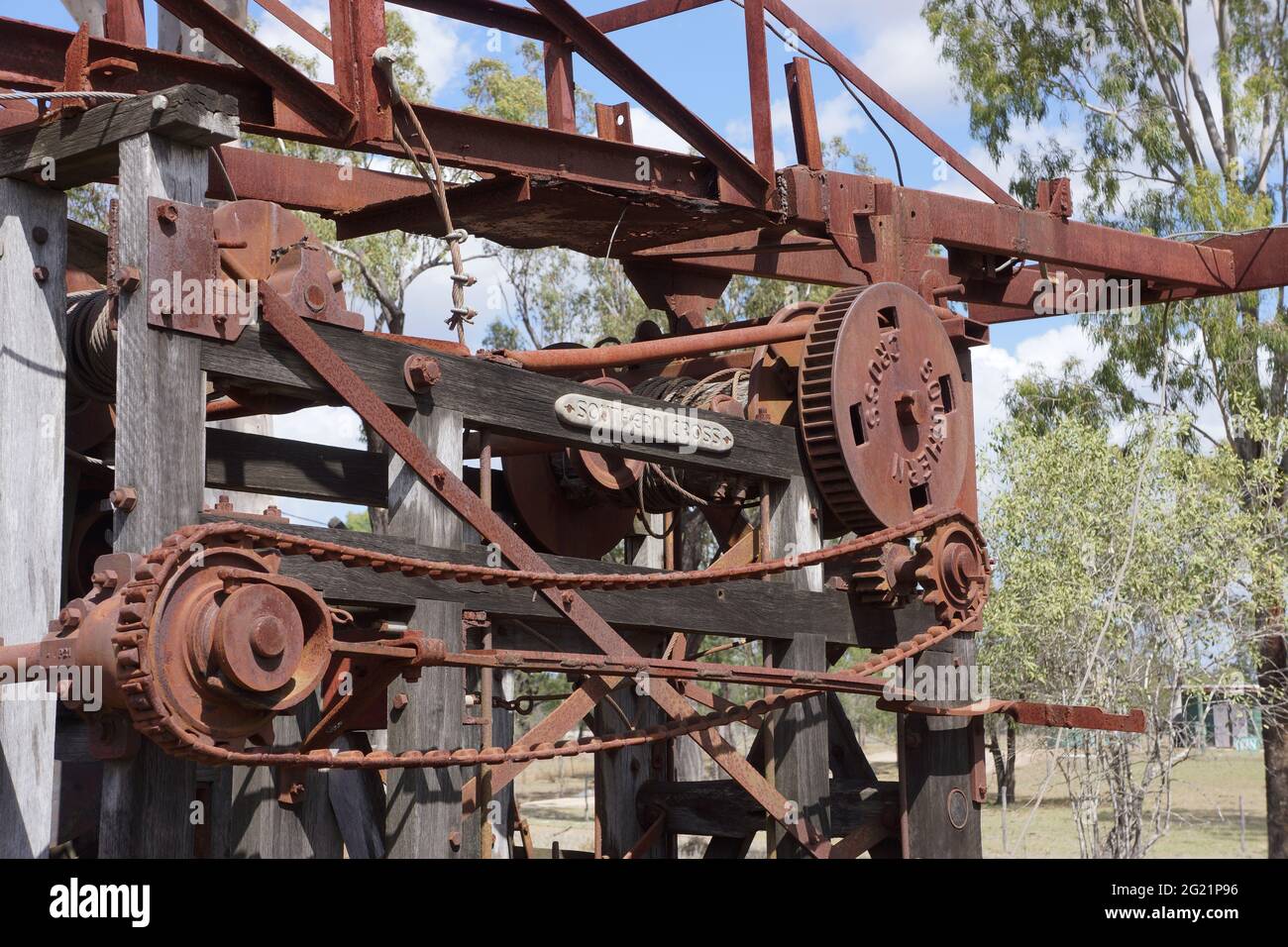 Closeup of vintage old water drilling rig machinery made of wood and