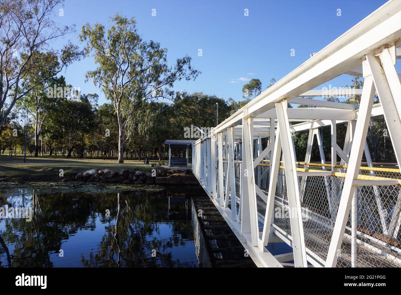 A steel walkway across Hood Lagoon in Clermont, Queensland. Stock Photo