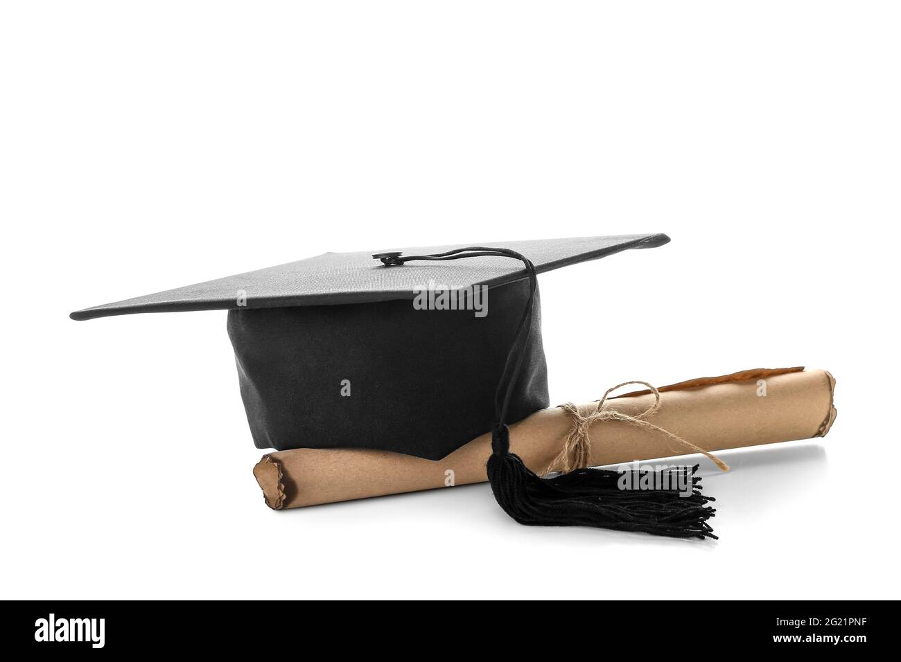 Graduation hat with diploma on white background Stock Photo - Alamy