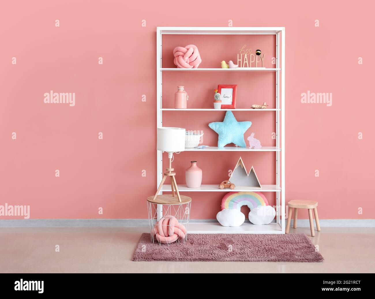 Shelf with toys and decor in children's room Stock Photo Alamy