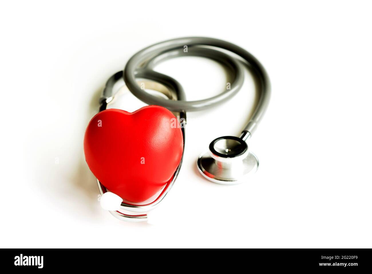 Stethoscope with heart isolated on white background Stock Photo - Alamy
