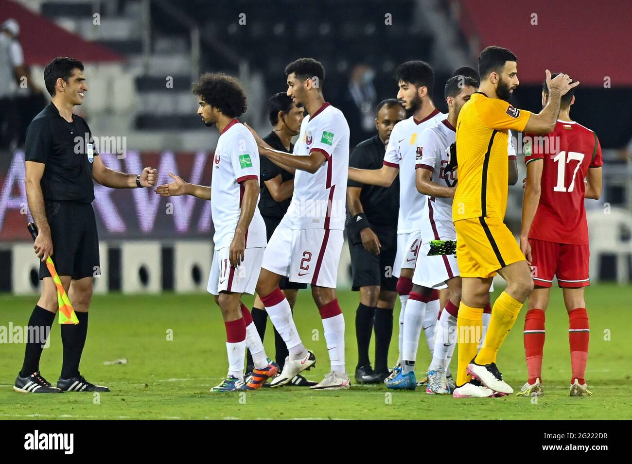 Oman National Football Team players celebrating a goal in the year 2022