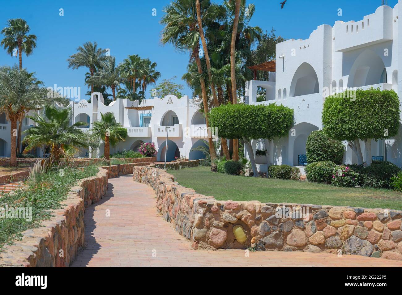 Villas, Bungalows and apartments at a luxury hotel resort. path along