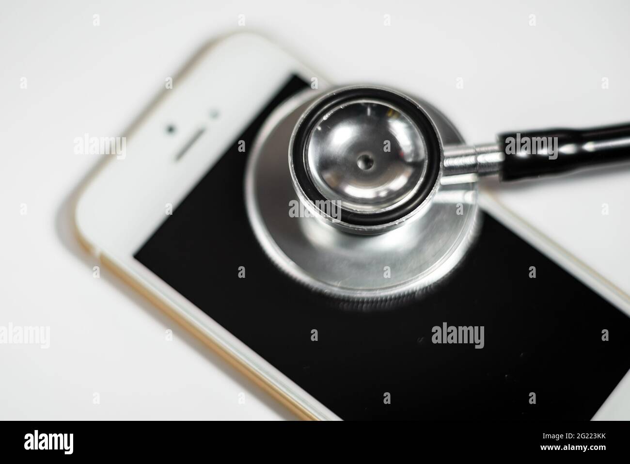 Stethoscope With Smart Phone On White Abstract Background To Solution Or Key Of Solution Problem For Smart Phone Stethoscope With Mobile Phone On Wh Stock Photo Alamy