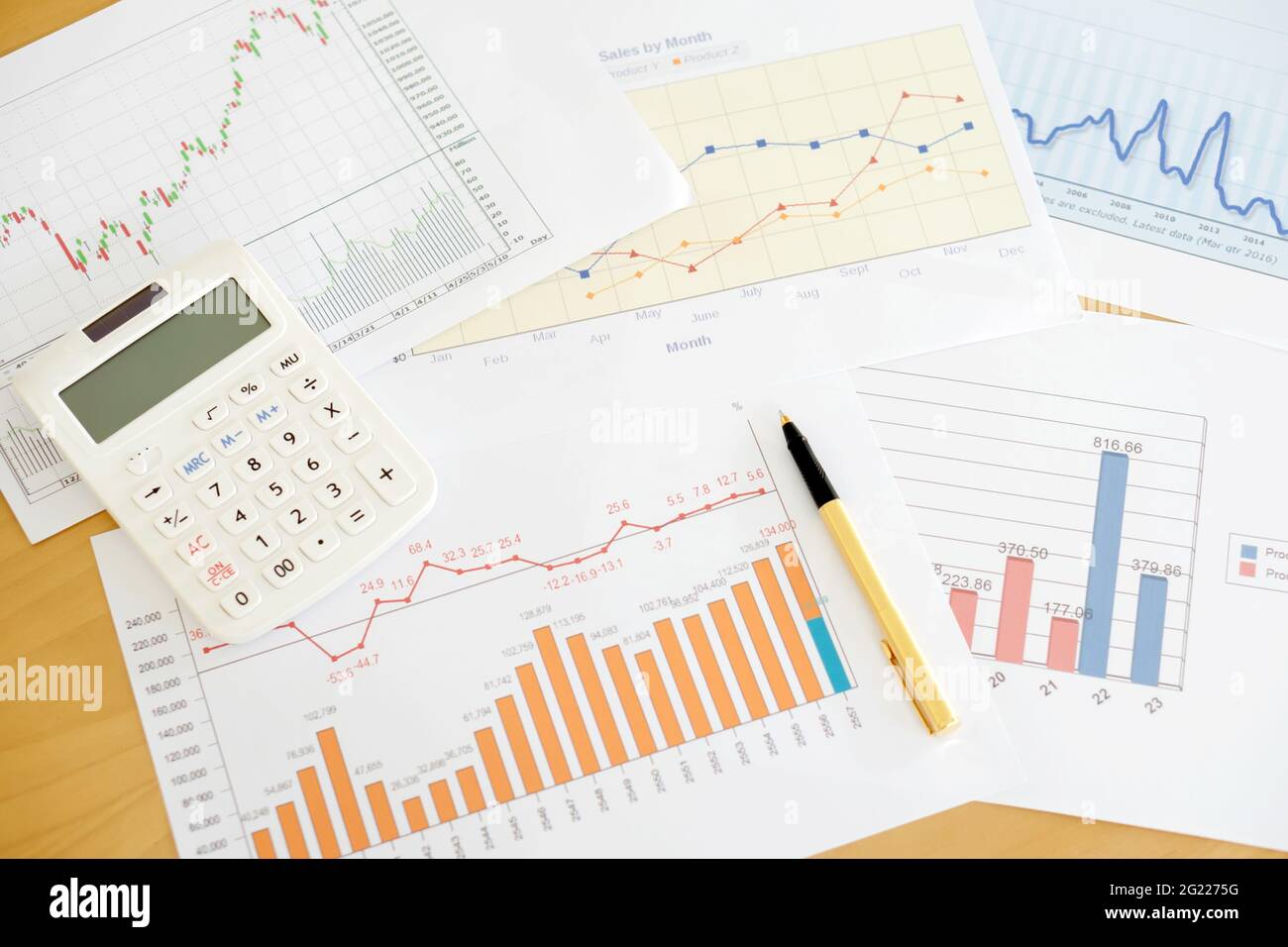 Graphs and Calculator Stock Photo - Alamy