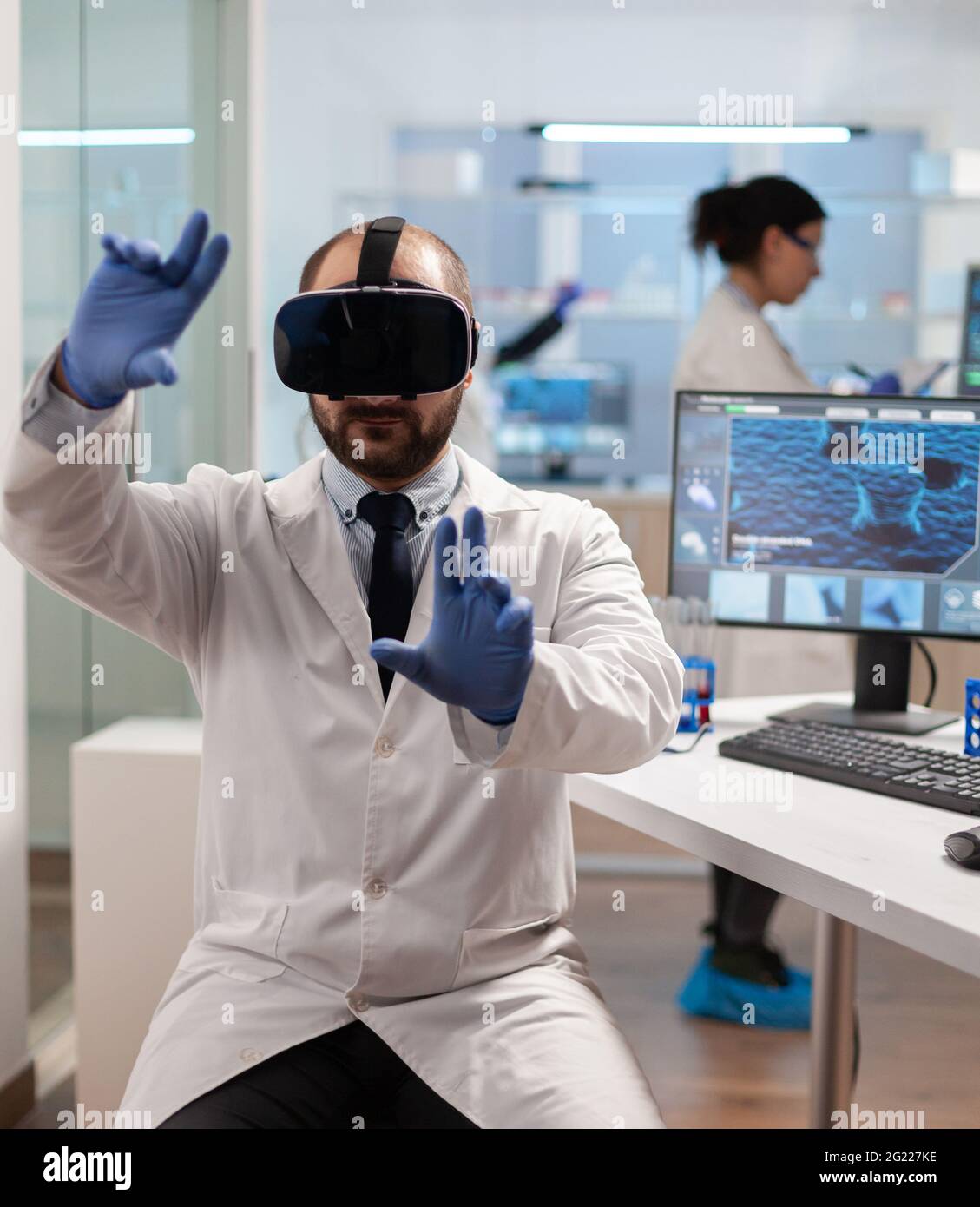 Professional scientist using medical inovation in lab wearing virtual