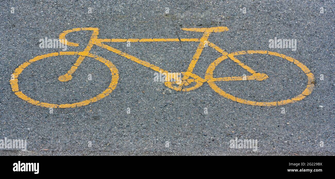 Bike Path Symbol Stencil'd on Asphault (photograph) Stock Photo