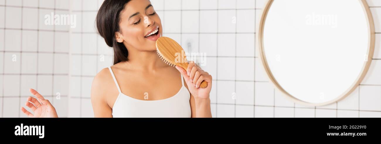 Singing Into Brush High Resolution Stock Photography and Images - Alamy