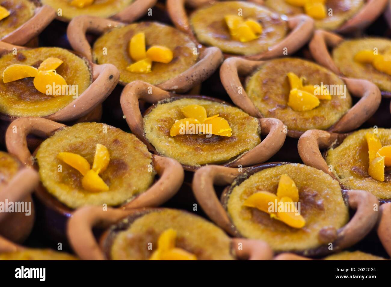 Thai dessert in clay pots,Mung Bean Thai Custard Dessert at floating