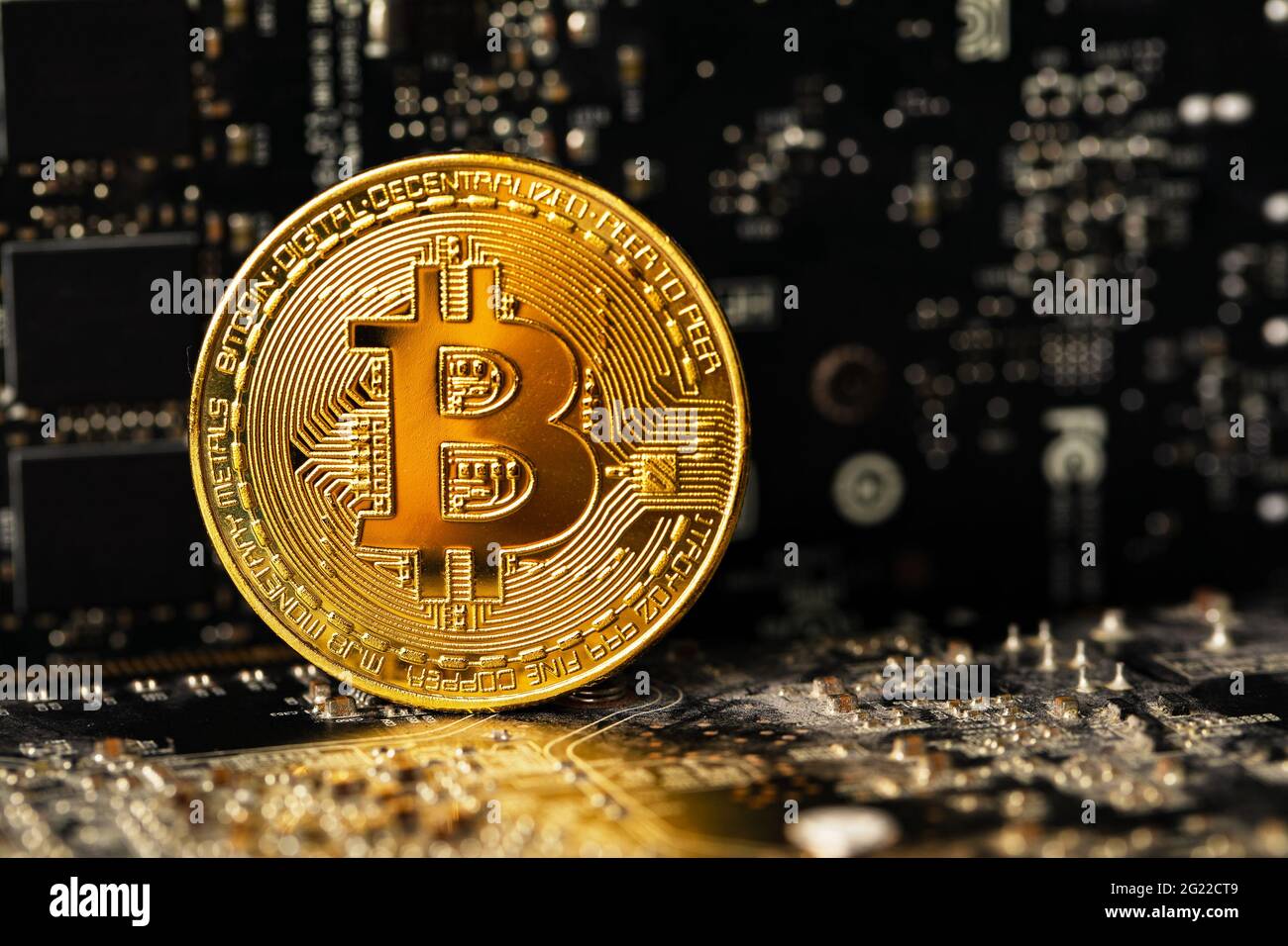 Dark gold bitcoin on crypto mining GPU circuit board computer hardware  Stock Photo - Alamy