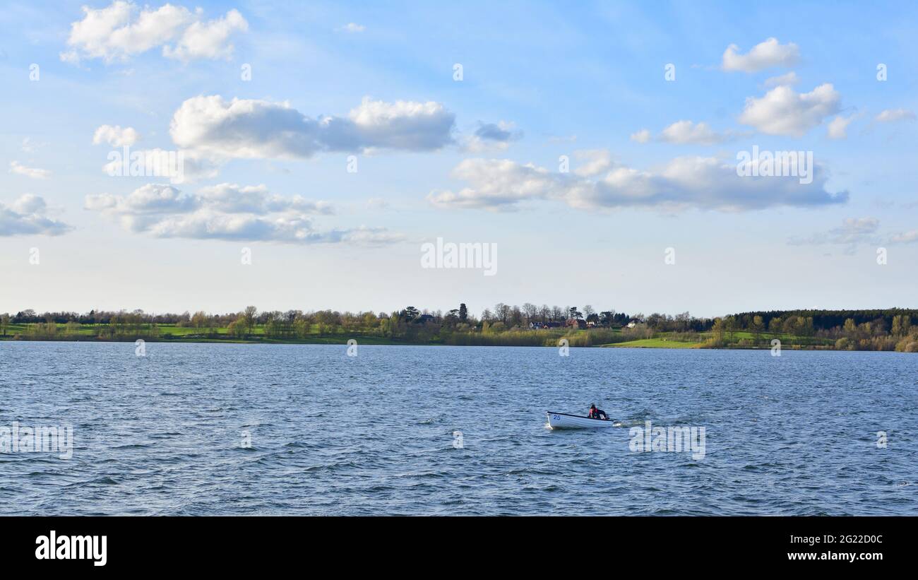 Small boat in the Draycote Water in England, the UK Stock Photo