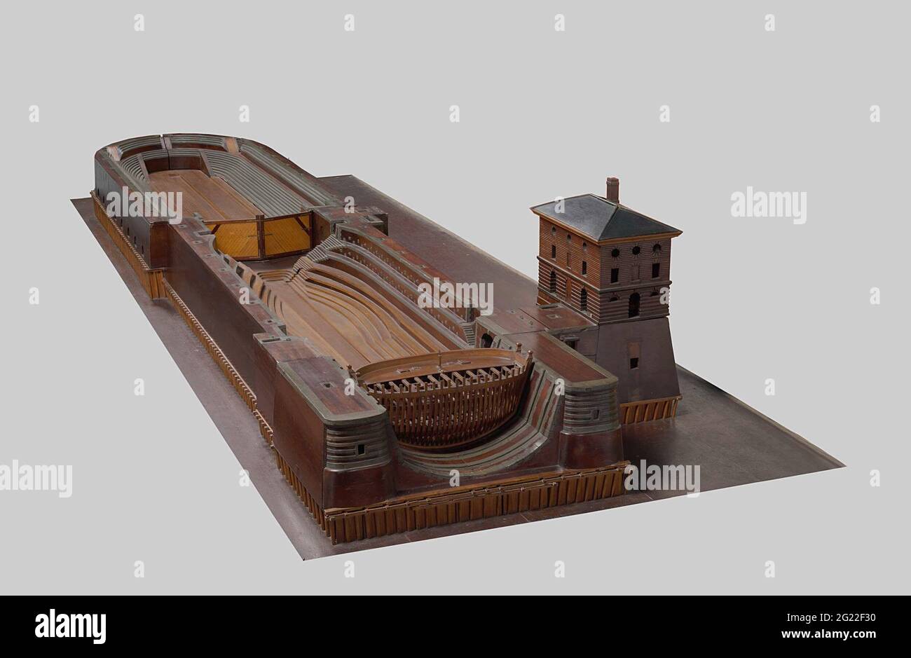 Model of the Double Dry Dock at Hellevoetsluis. Model of two drying docks placed in succession with the steam pump next to the first dock, on a base plank. The entrance has six rebates for the open-worked pant model of the ship door with double keel; The entrance to the second dock is closed with lock gates. Part of the roof of the steam pumping station can be removed. The entire dock and the outbuildings are underdiques. Scale approx. 1:50 (derived). Stock Photo