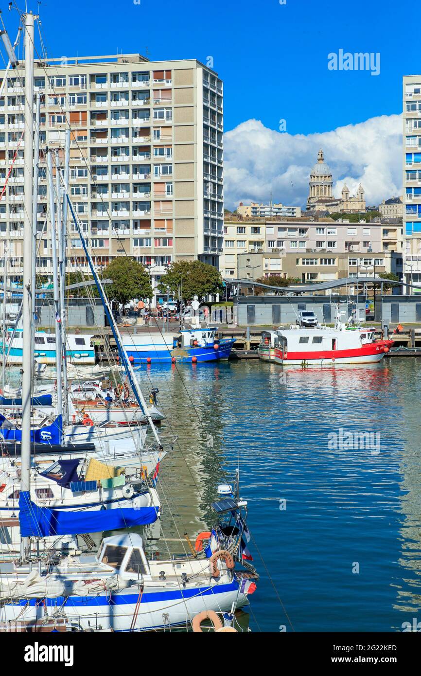 Boulogne sur Mer (northern France): the marina with buildings along Boulevard Gambetta in the background. In the middle, the Basilica of Notre Dame de Stock Photo