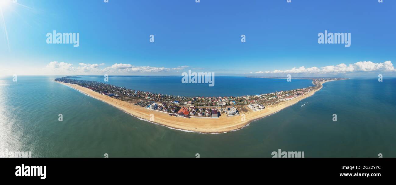 Aerial view of the spit (relief) with the city. Horizontal panorama. The Black Sea and Dniester estuary. Zatoka, Odesa region, Ukraine Stock Photo