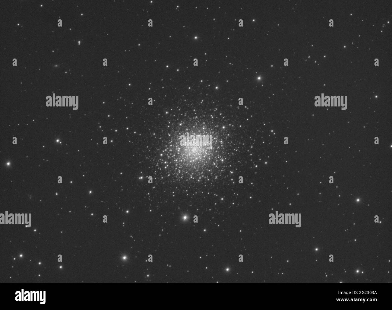 Closeup of Messier 92 globular cluster in Hercules constellation, taken with my telescope with luminance filter. Stock Photo
