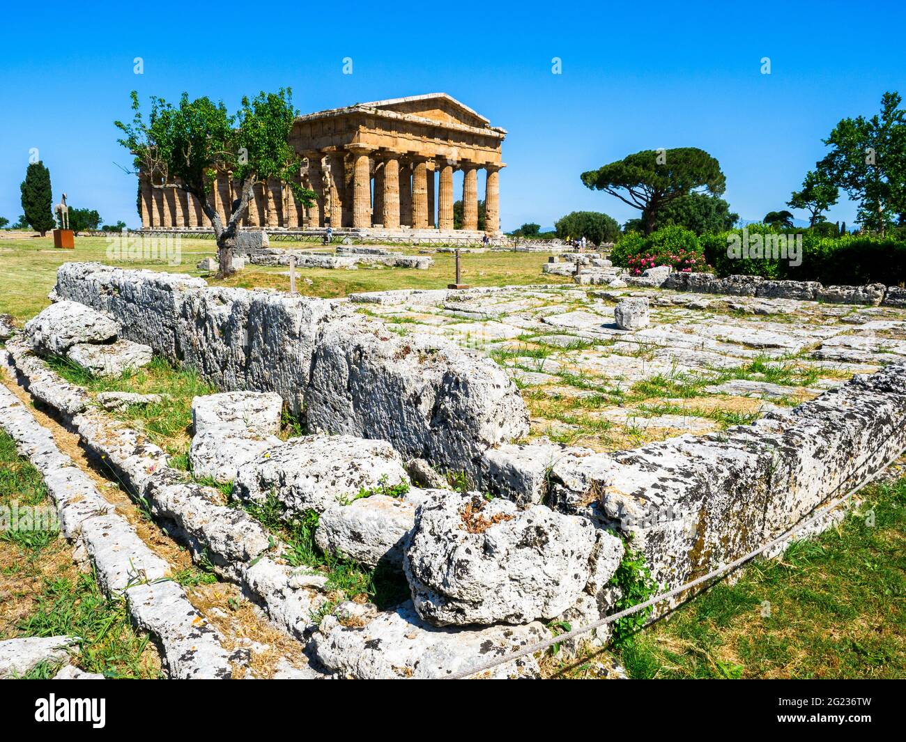 Water clock and the Greek doric style temple of Neptune