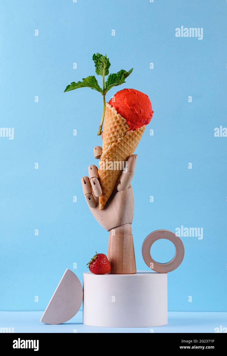 Strawberry ice cream in waffle cone Stock Photo - Alamy