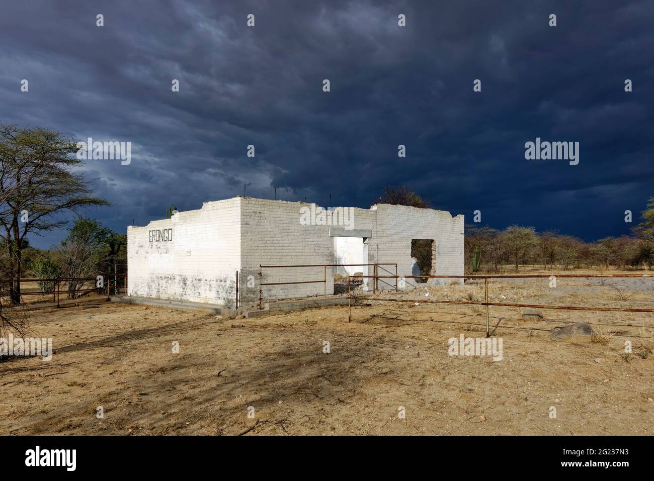 Rain clouds above a ruined building near Omaruru, farmland in rainy season, Erongo Region, Namibia Stock Photo