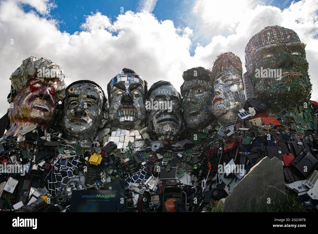 Carbis Bay, Cornwall, UK. 08th June, 2021. G7 Mount Recyclemore, 'Mount Rushmore', sculpture made of electronic waste is built on a beach in Carbis Bay Cornwall. Looking over the G7 summit, The seven faces definitely look like the world leaders who will be attending the G7 Summit this week. UK Prime Minister Boris Johnson, Japanese Prime Minister Yoshihide Suga, France's president Emmanuel Macron, Italian Prime Minister Giuseppe Conte, Canadian Prime Minister Justin Trudeau, German Chancellor Angela Merkel and US President Joe Biden. Credit: kathleen white/Alamy Live News Stock Photo