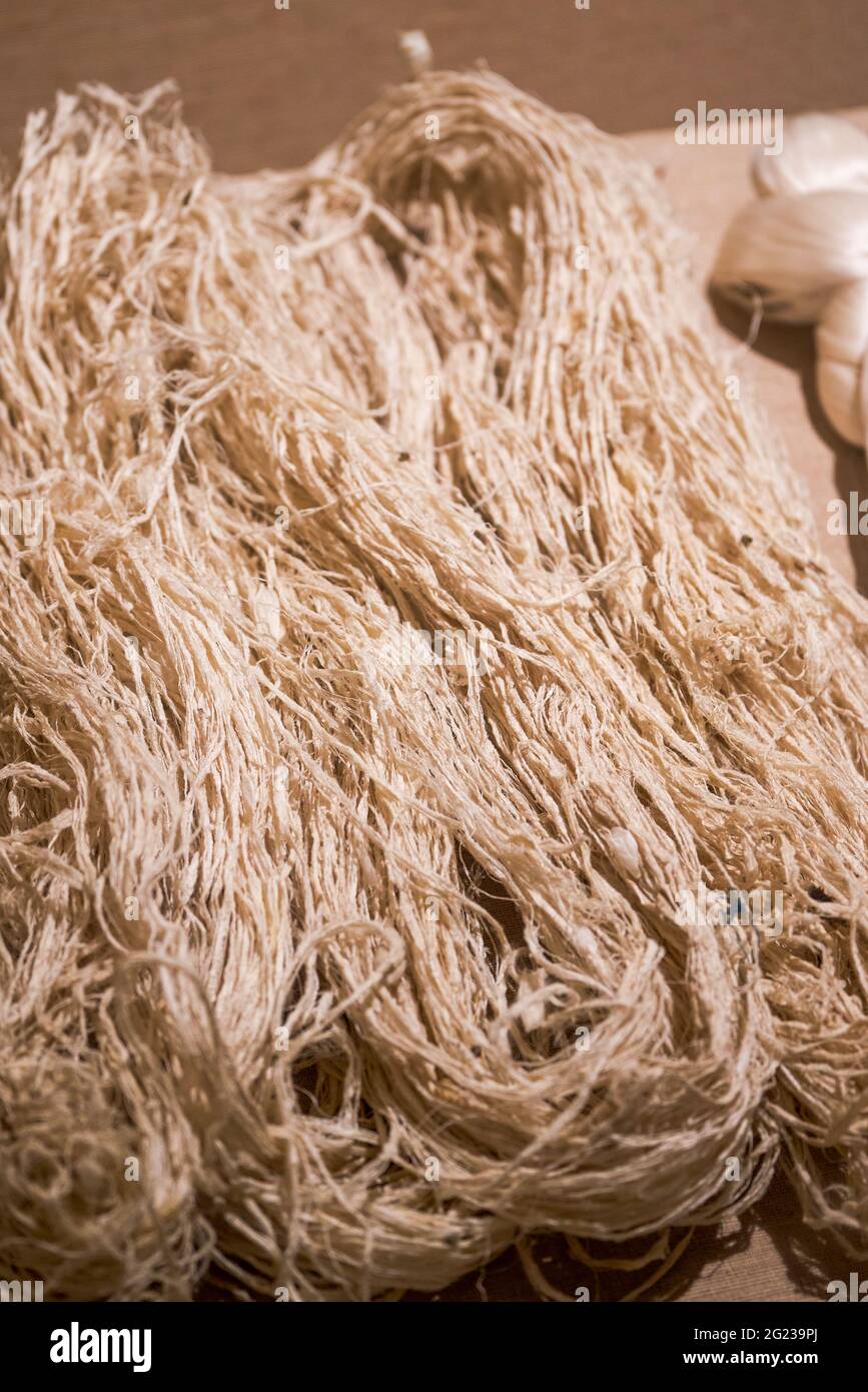A bundle of cotton hemp rope and silk raw material closeup Stock Photo