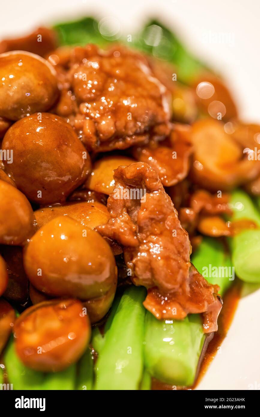 A delicious classic Cantonese dish, stirfried beef with straw mushroom