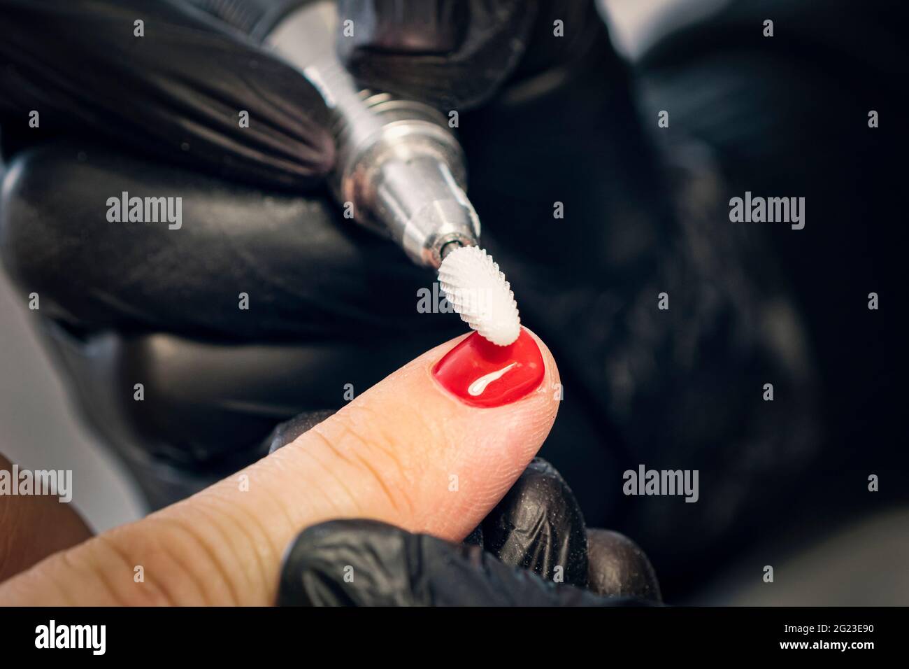 Men's manicure. Design of men's manicure. The master makes a man manicure.  The concept of professional nail care. Close-up of the manicurist's hands a  Stock Photo - Alamy