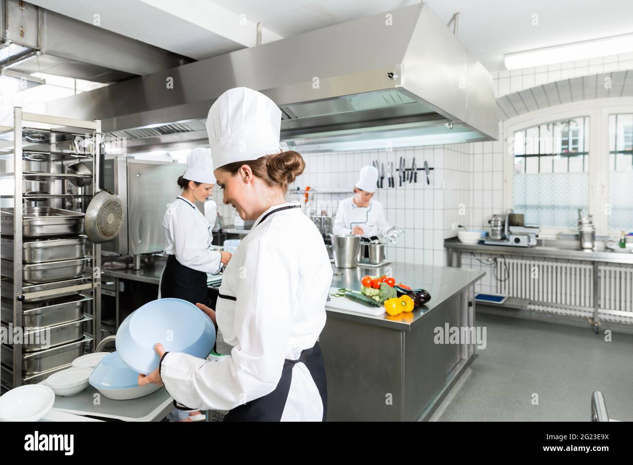 Commercial kitchen with chefs cooking Stock Photo Alamy