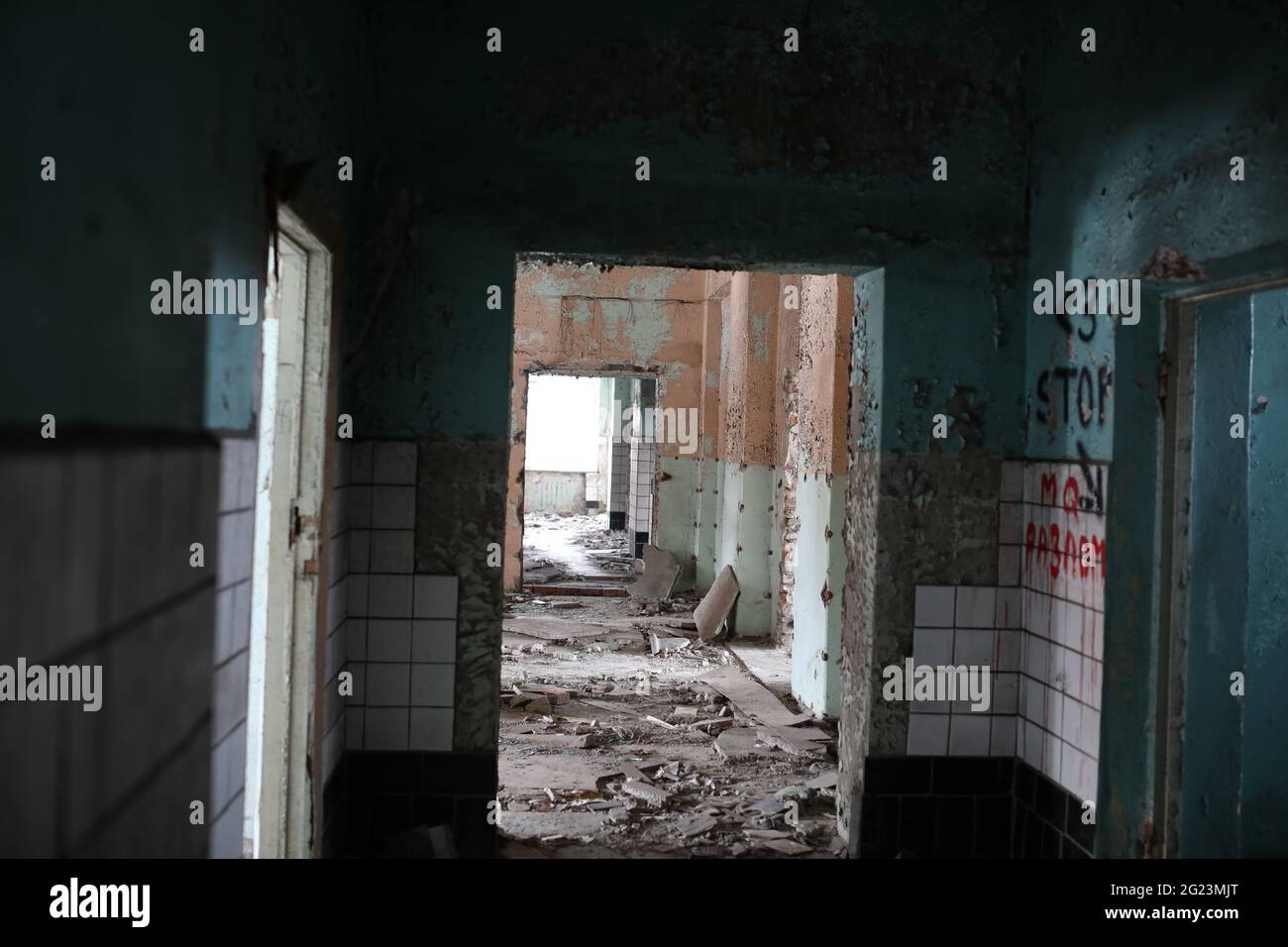 abandoned scary dark room in a large multi-storey building Stock Photo