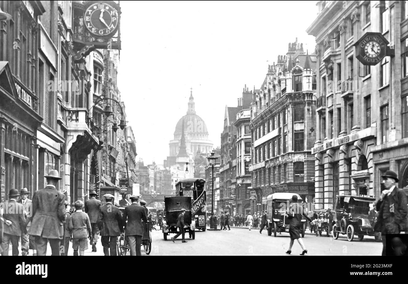 FLEET STREET, London, about 1925,looking east towards Ludgate Circus and St. Paul's Cathedral. The Daily Telegraph building is at left and the News Chronicle offices at right. Stock Photo
