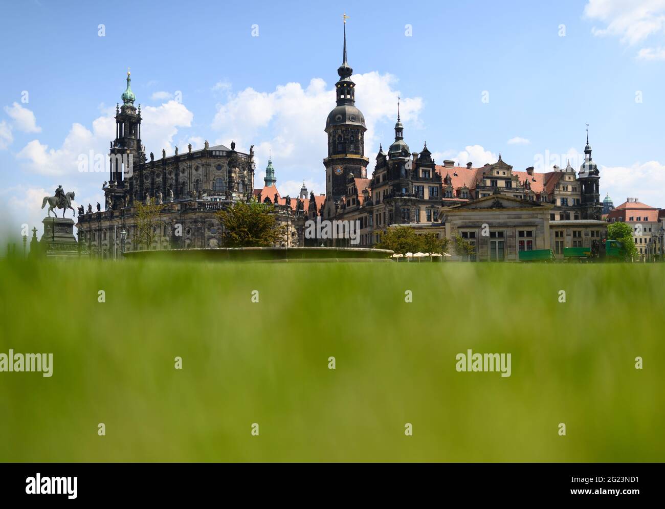 Dresden, Germany. 08th June, 2021. Afternoon view over the Theaterplatz to the Old Town with the equestrian statue of King Johann (l-r), the Hofkirche, the Hausmannsturm, the Residenzschloss and the Schinkelwache. Credit: Robert Michael/dpa-Zentralbild/ZB/dpa/Alamy Live News Stock Photo