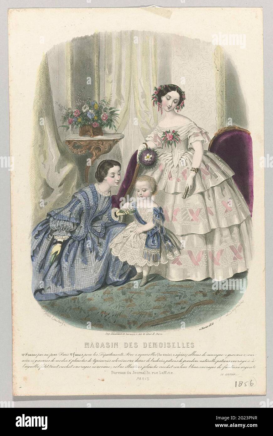 Magasin des Demoiselles, 25 Fvrier 1856, 12 Anne. A woman, with opened  box in hand, kneels next to a girl in a white dress with sash. Behind her  is a woman with