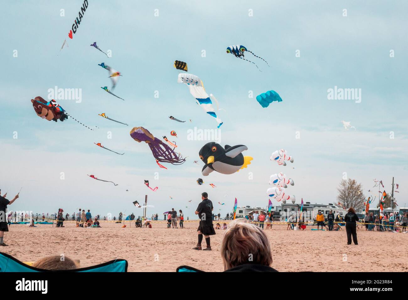 Lots of kites being flowing at a kite festival in Grand Haven Michigan