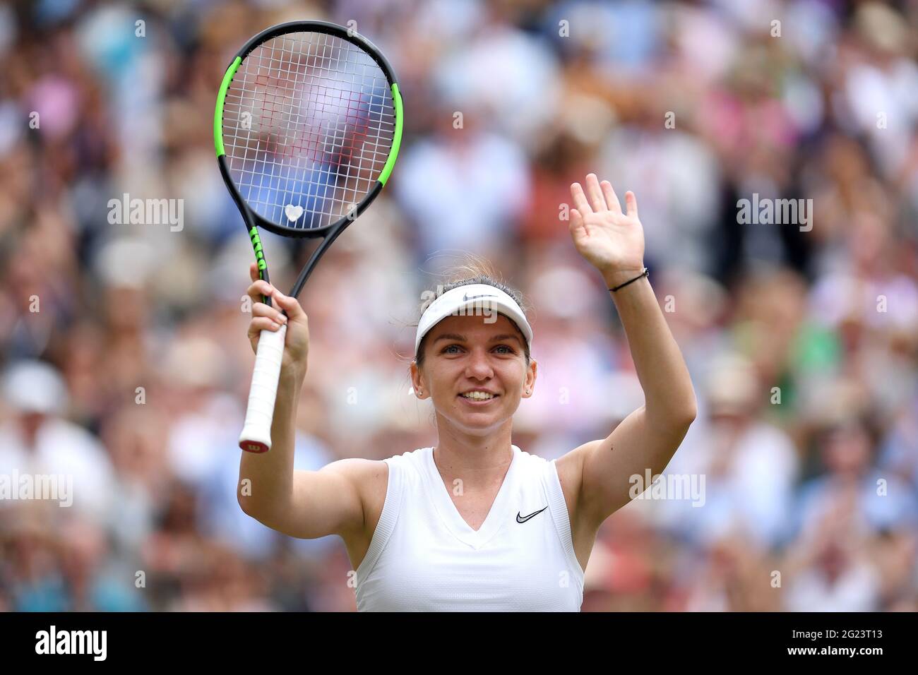 File photo dated 13-07-2019 of Simona Halep celebrates after winning the women's singles final following the women's singles final on day twelve of the Wimbledon Championships at the All England Lawn Tennis and Croquet Club, Wimbledon. Issue date: Tuesday June 8, 2021. Stock Photo