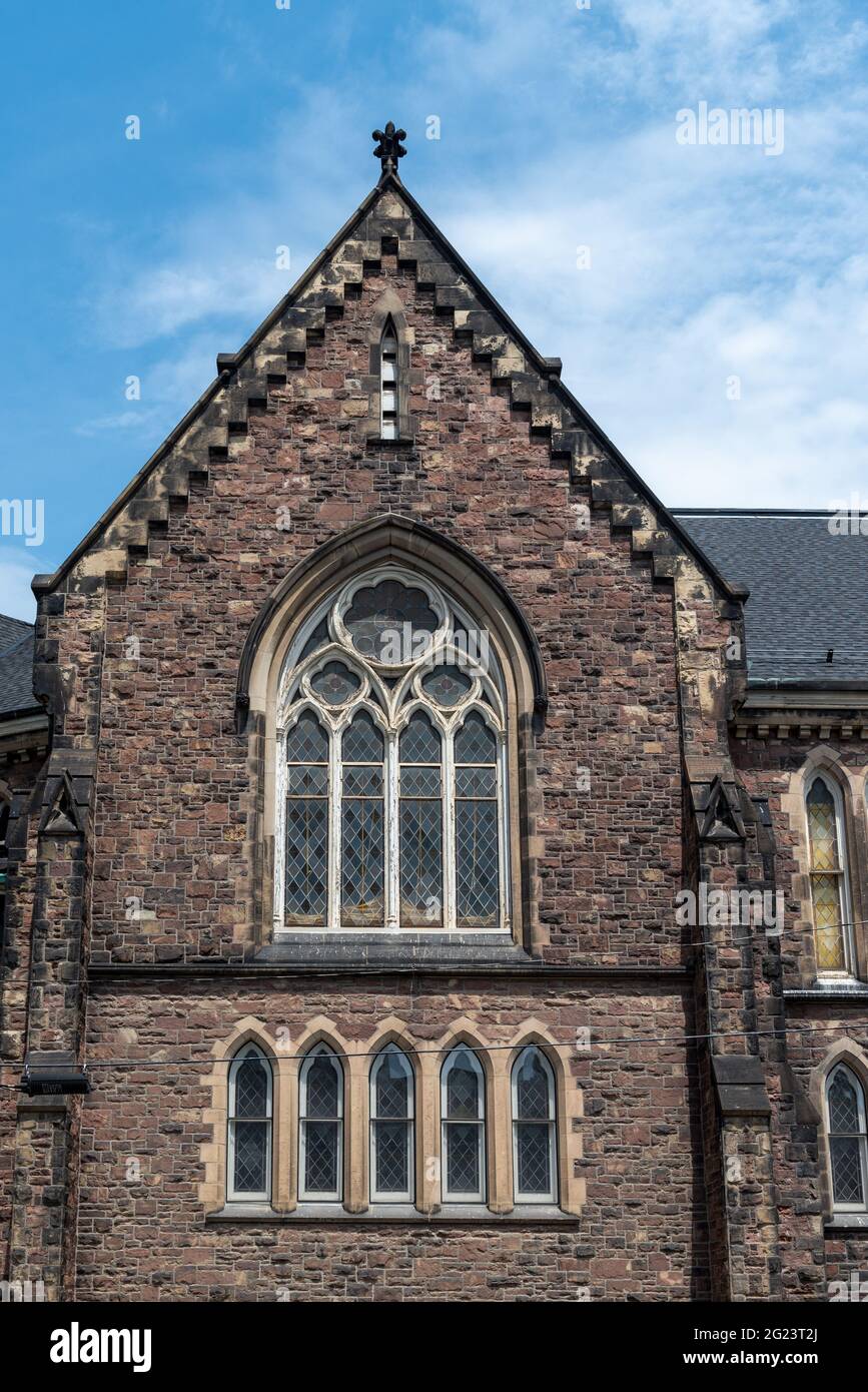 Side wall with window in the Jarvis Street Baptist Church in Toronto, Canada. The colonial building is a city heritage landmark Stock Photo
