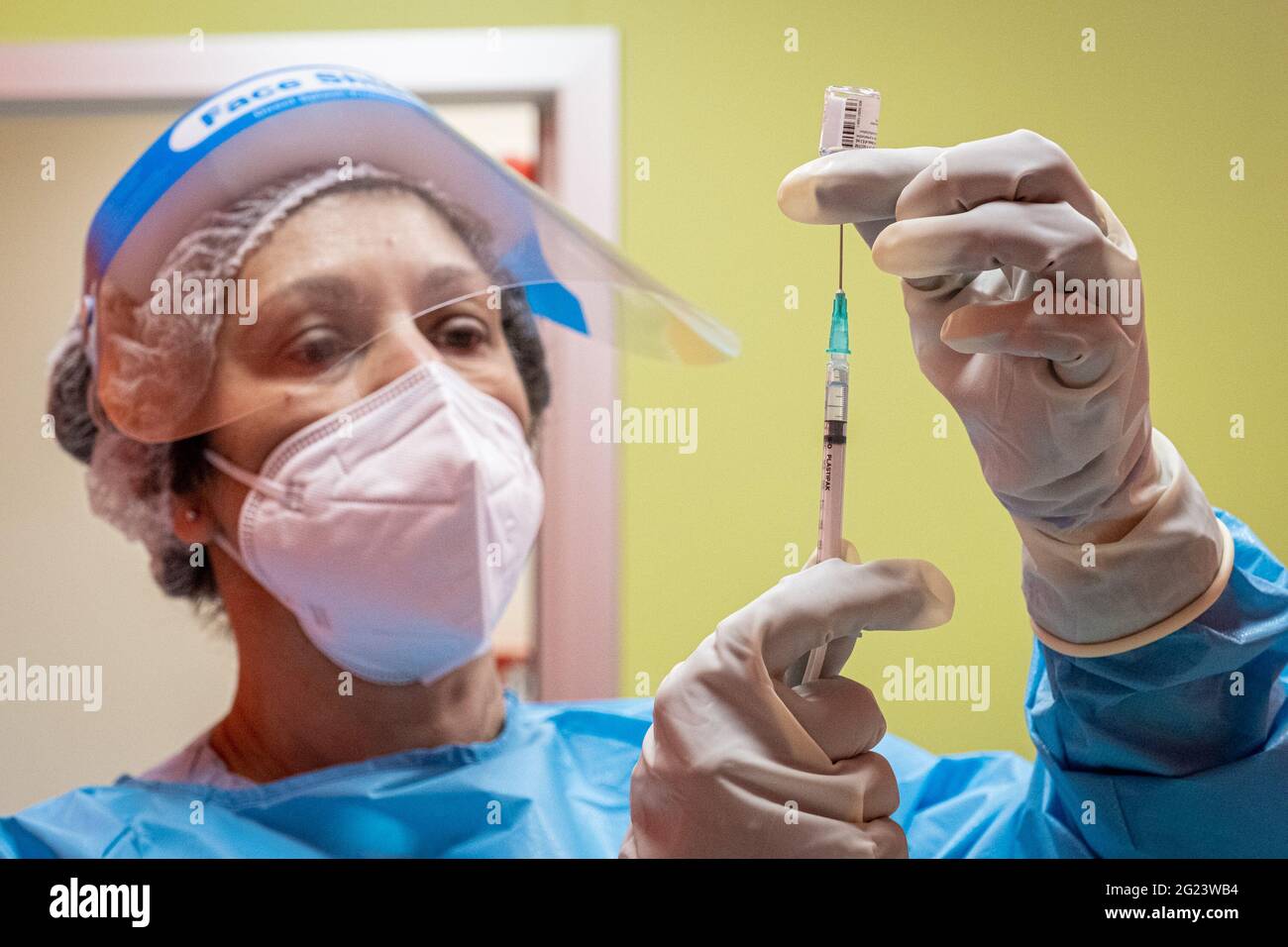 Milan - Covid-19 vaccine at the Niguarda hospital, preparation and dilution of the vaccine vials. Vaccinations for doctors and health personnel (Milan Stock Photo